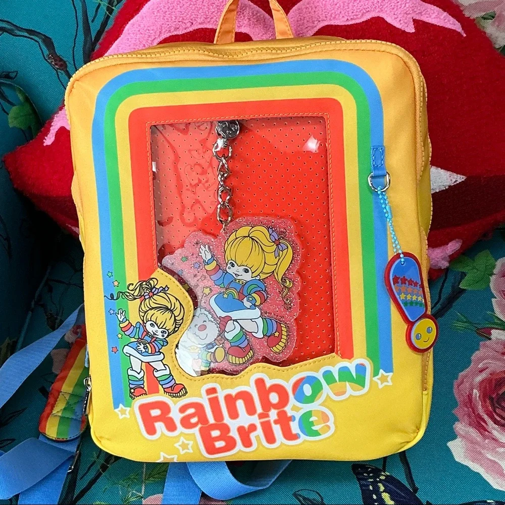 RAINBOW BRITE VINTAGE BOX PIN TRADING BACKPACK W/ ACRYLIC CHARM - Picture 1 of 4